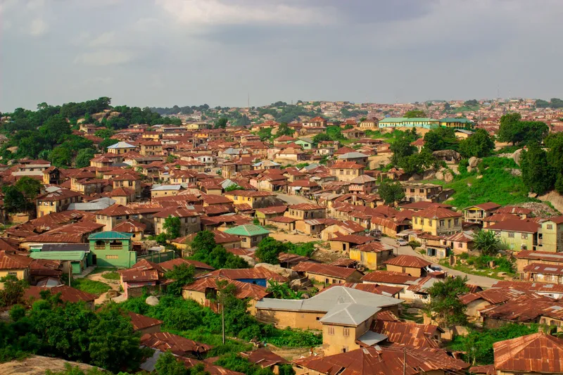 Aerial view of Abeokuta's rooftops and the rocky granite outcrops the city is built around, Ogun State