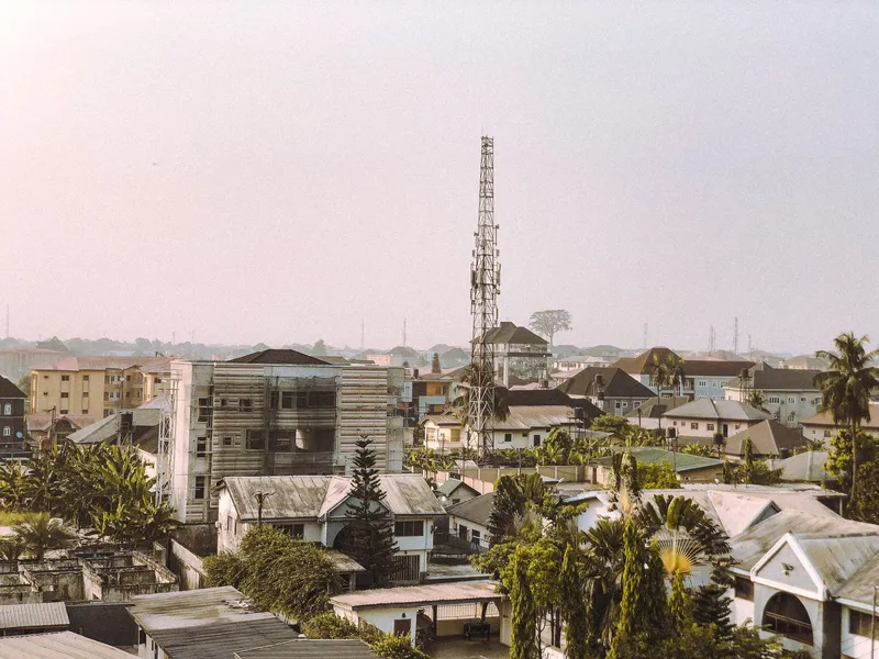 Rooftop view of residential buildings and a communications tower in Port Harcourt, Rivers State